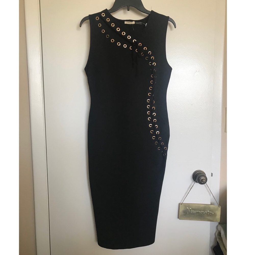 Black sheath dress with gold details